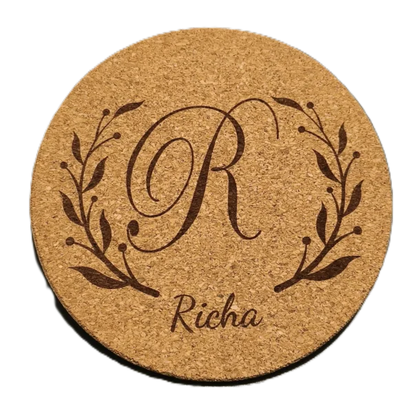 Personalized round cork coaster with engraved monogram initial and custom name