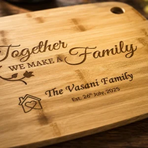 Close-up macro view of a personalised engraved bamboo chopping board showcasing detailed laser engraving with warm natural lighting and blurred background.